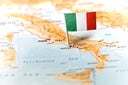 Italy pinned on the map with flag
