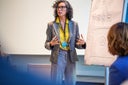 Female professional giving a presentation in a seminar
