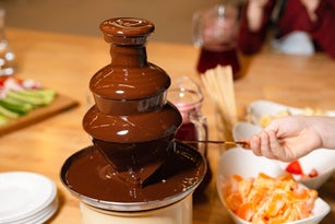 Flowing Chocolate Fountain with Dipping Strawberry