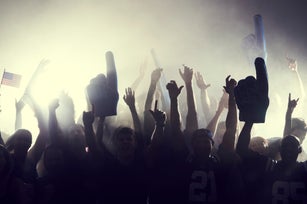 Crowd of sports fans cheering