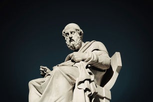 Statue of the ancient Greek philosopher Plato in Athens, Greece.