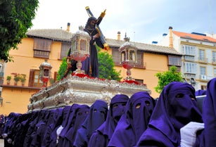 Costaleros bearing a Tronos during Semana Santa in Malaga, Spain