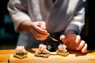 Close up of chef making nigiri sushi