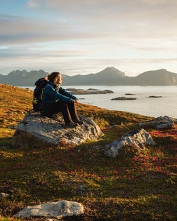 Woman enjoys the Norwegian countryside