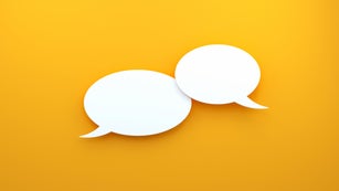 Chat Concept - White Chat Bubbles Over Yellow Background
