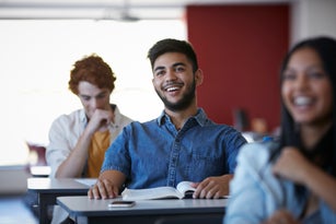 Students laughing in classroom