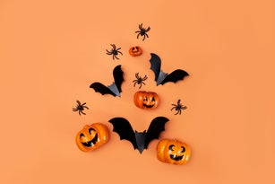 Halloween holiday concept. Empty rustic table in front of spider web background. Ready for product display montage