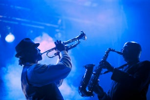 Musicians playing in jazz band on stage