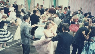 Teenage couples (15-18) dancing at party