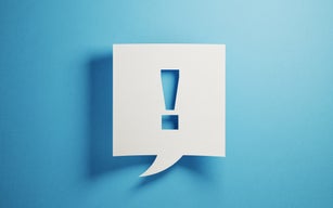 White Chat Bubble On Blue Background