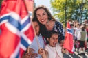 Portrait of happy family celebrating Norwegian National Day