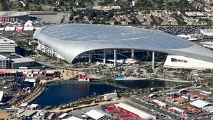 Crews engage in final preparations for Super Bowl LVI at SoFi Stadium.