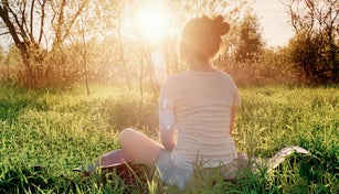 Young woman enjoying sunset