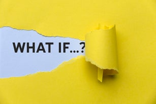 Yellow Torn Paper Revealing the Word 'What if...?'.