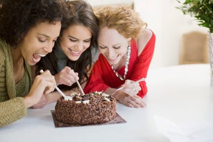 Friends eating chocolate cake