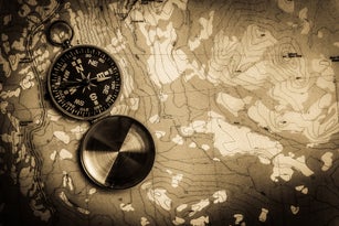 Compass on topographical map
