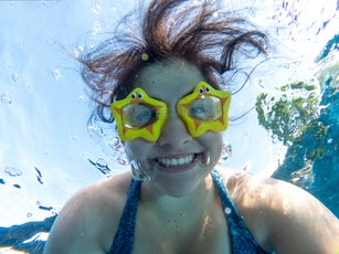 derwater Selfie, Smiling Multiracial Young Woman Wearing Goggles in Pool