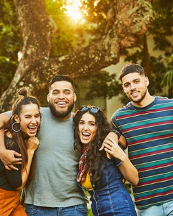 Portrait of multi-ethnic happy friends in party