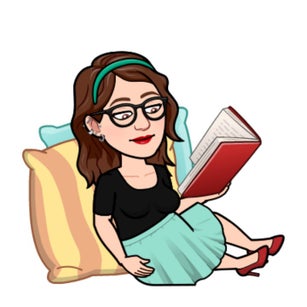 Teacher reading a book on floor