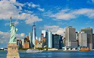 Concept of New York city. Statue of Liberty. Downtown