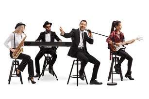 Music band with a guitarist, sax and keyboard and a singer