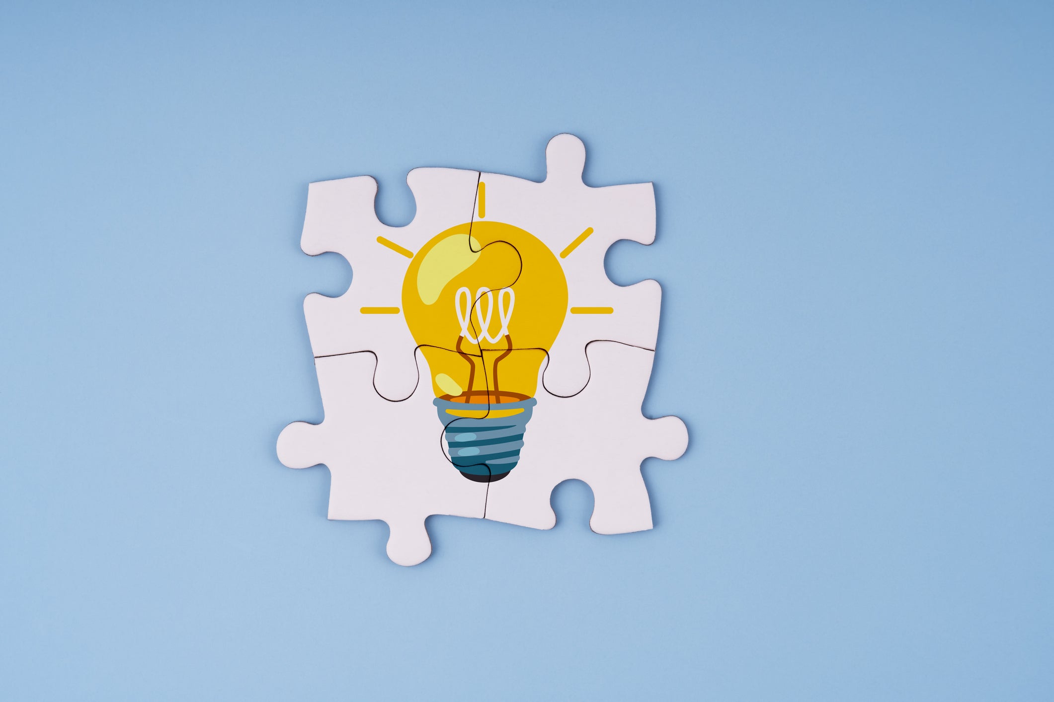 Light Bulb on Jigsaw Puzzle