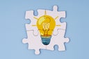 Light Bulb on Jigsaw Puzzle