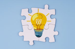 Light Bulb on Jigsaw Puzzle