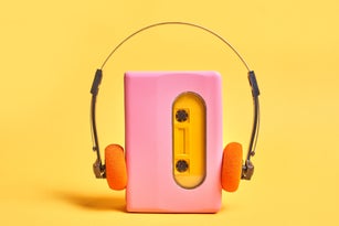 Pink Portable Audio Cassette Player On Yellow