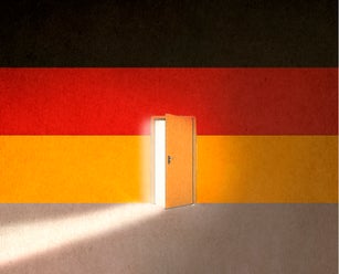 German flag with light of opportunity behind ajar door to immigrate in Germany