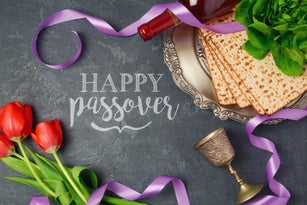 Passover holiday greeting card matzoh and tulip flowers on dark background. Top view from above