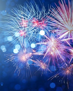 Abstract fireworks celebration on bokeh festive  light background