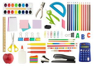 Various school supplies on white background