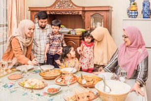 Family Eating in Dining Room
