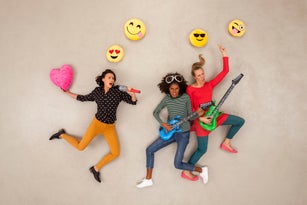 Friends playing music in a rock band