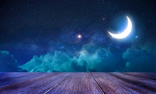 Ramadan Kareem Moon On Table With Abstract Defocused Lights