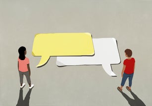 Couple talking, looking down at communication speech bubbles