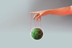 Ruling and controlling the world conceptual still life.