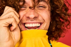 Colourful studio portrait of a young man