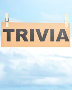 Brown paper hanging on the rope with trivia text