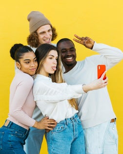 Portrait of multi-ethnic group of young people taking a selfie
