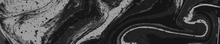 Abstract swirls covered with specks of paint