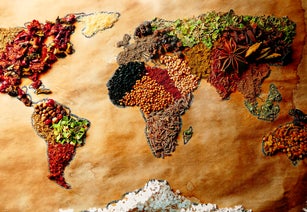 World map made of different colorful grains and seeds