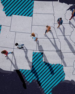 Top view of group of people, walking across United States map, painted on asphalt