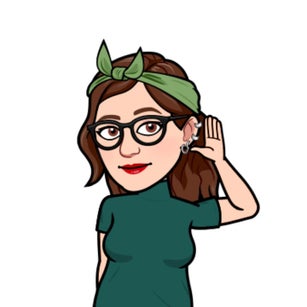 Teacher with hand cupped to her ear listening 