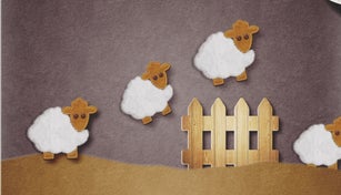sheeps jumping a fence at night/ counting sheep concept