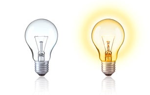 Classic light bulb isolate on white background. Turn on and turn off of Tungsten light bulb show big idea,  innovation, save energy, idea of Evolution, old style or retro light bulb Concept.