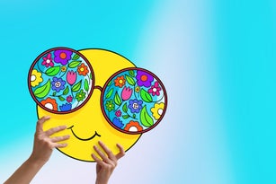 Woman holding emoji