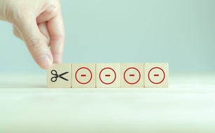 Cutting losses concept. Cut or eliminate the loss of the red minus sign to protect gains, limit losses on a security position. Investment strategy used in trading and investing. Financial management.