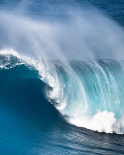 Huge ocean wave breaking on the North Shore of Maui